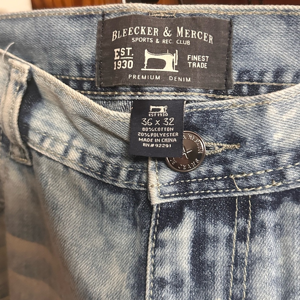 Blue Ripped & Mended Light Wash Jeans